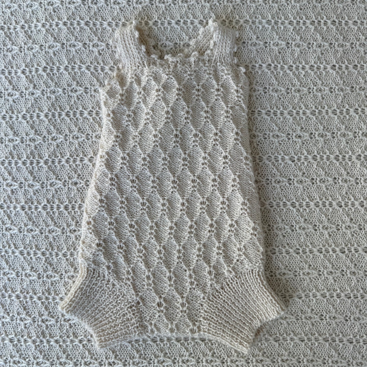 Nellie baby alpaca newborn romper front