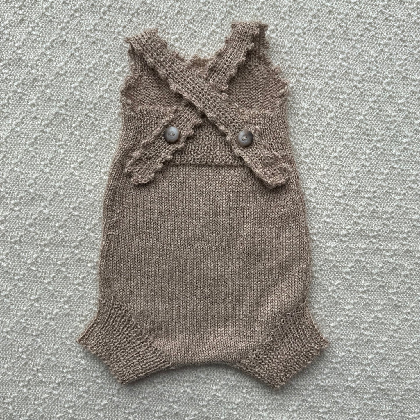Tan baby alpaca poppy romper with crochet straps back