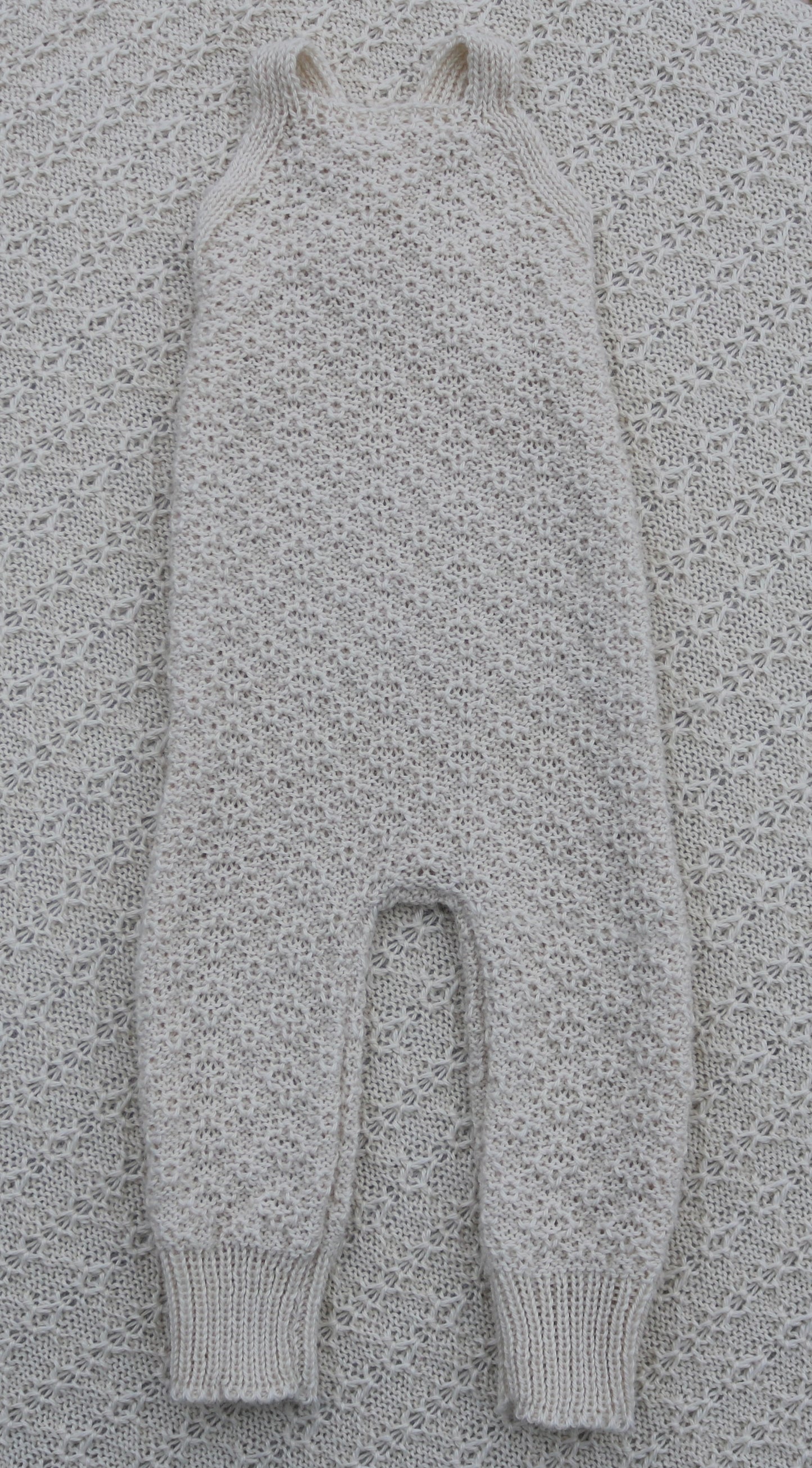 Handcrafted alpaca newborn overalls - soft, breathable, and sustainably made from 100% luxury alpaca wool. Designed for warmth, comfort, and timeless heirloom quality