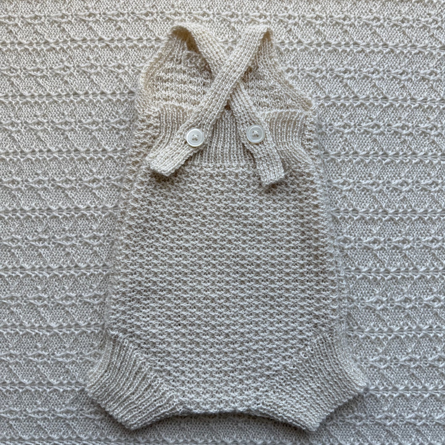 Eddie newborn alpaca baby romper back