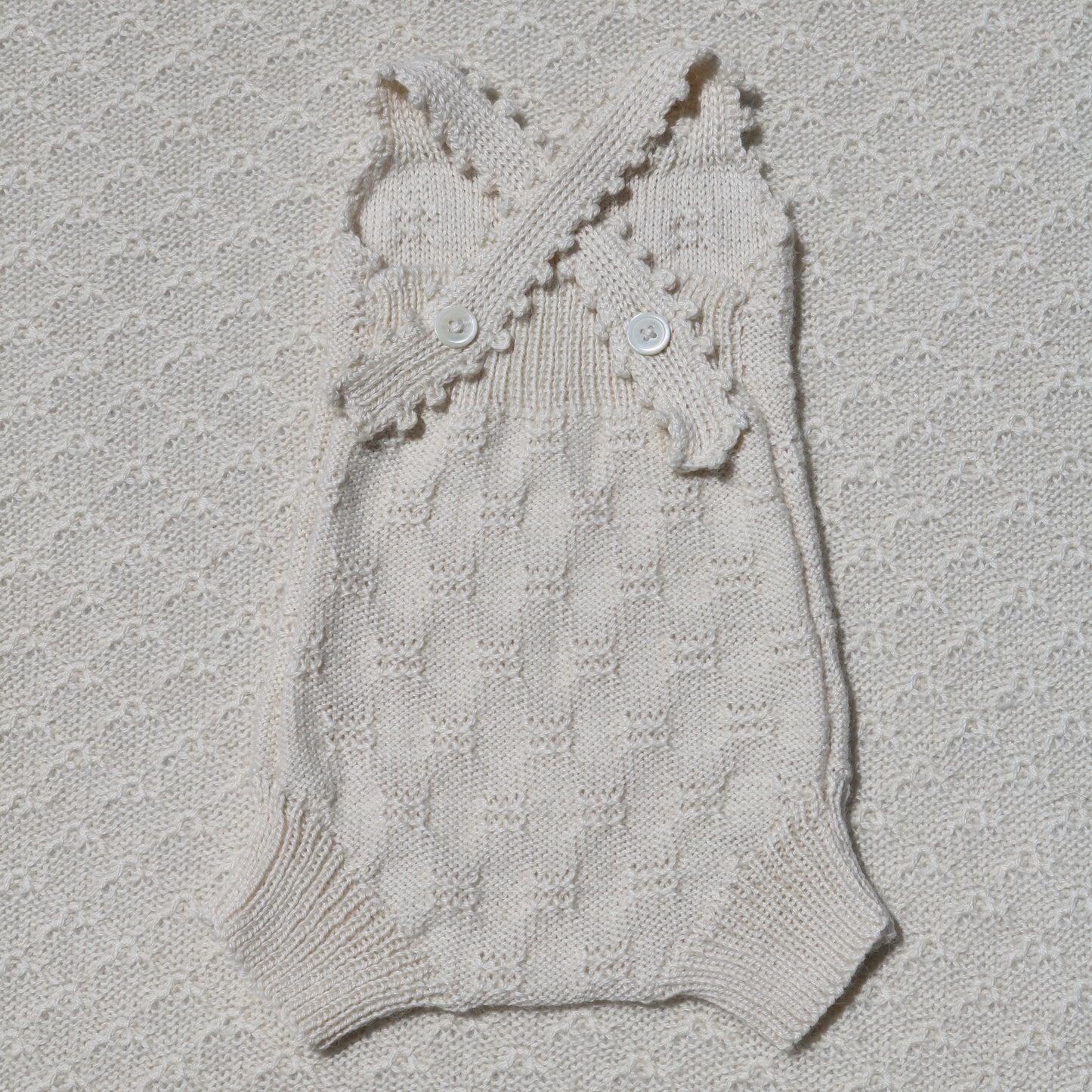 Charlie ivory alpaca romper with crochet straps back