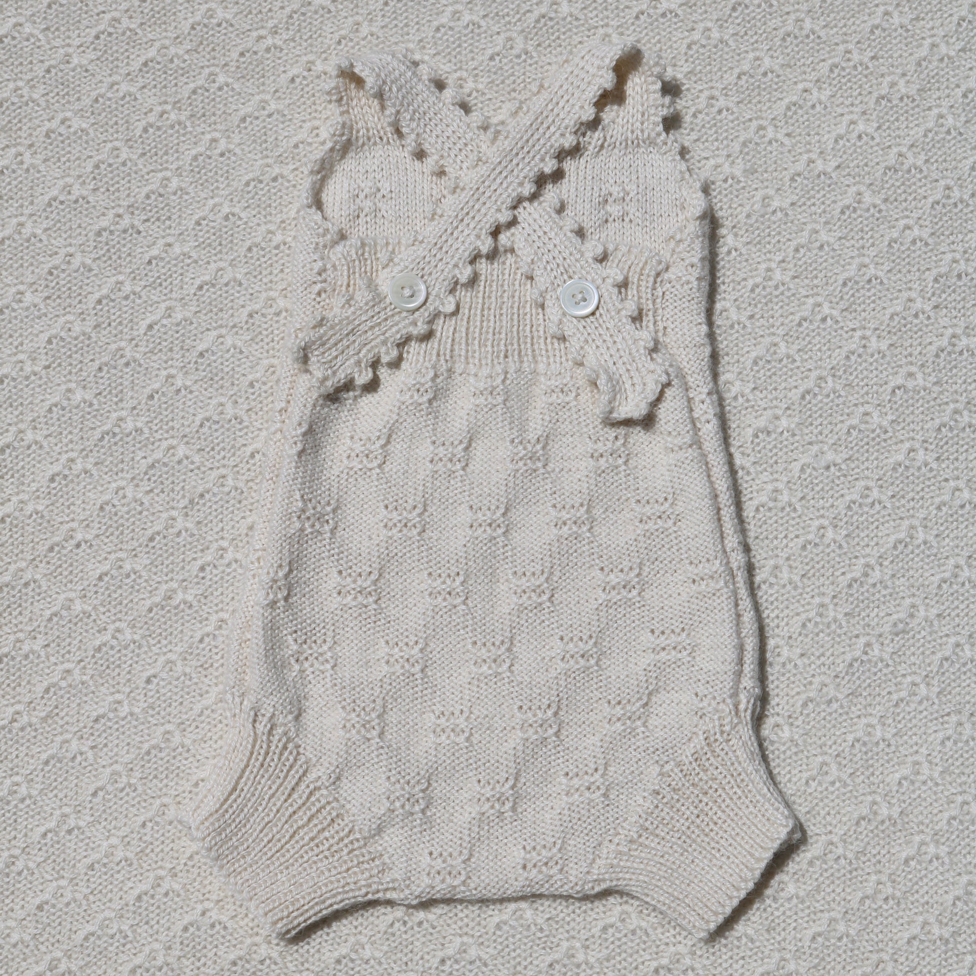 Charlie ivory alpaca romper with crochet straps back