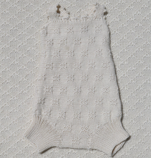 Charlie ivory alpaca romper with crochet straps front