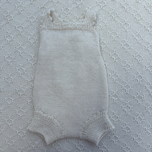 Poppy newborn alpaca romper with crochet straps front