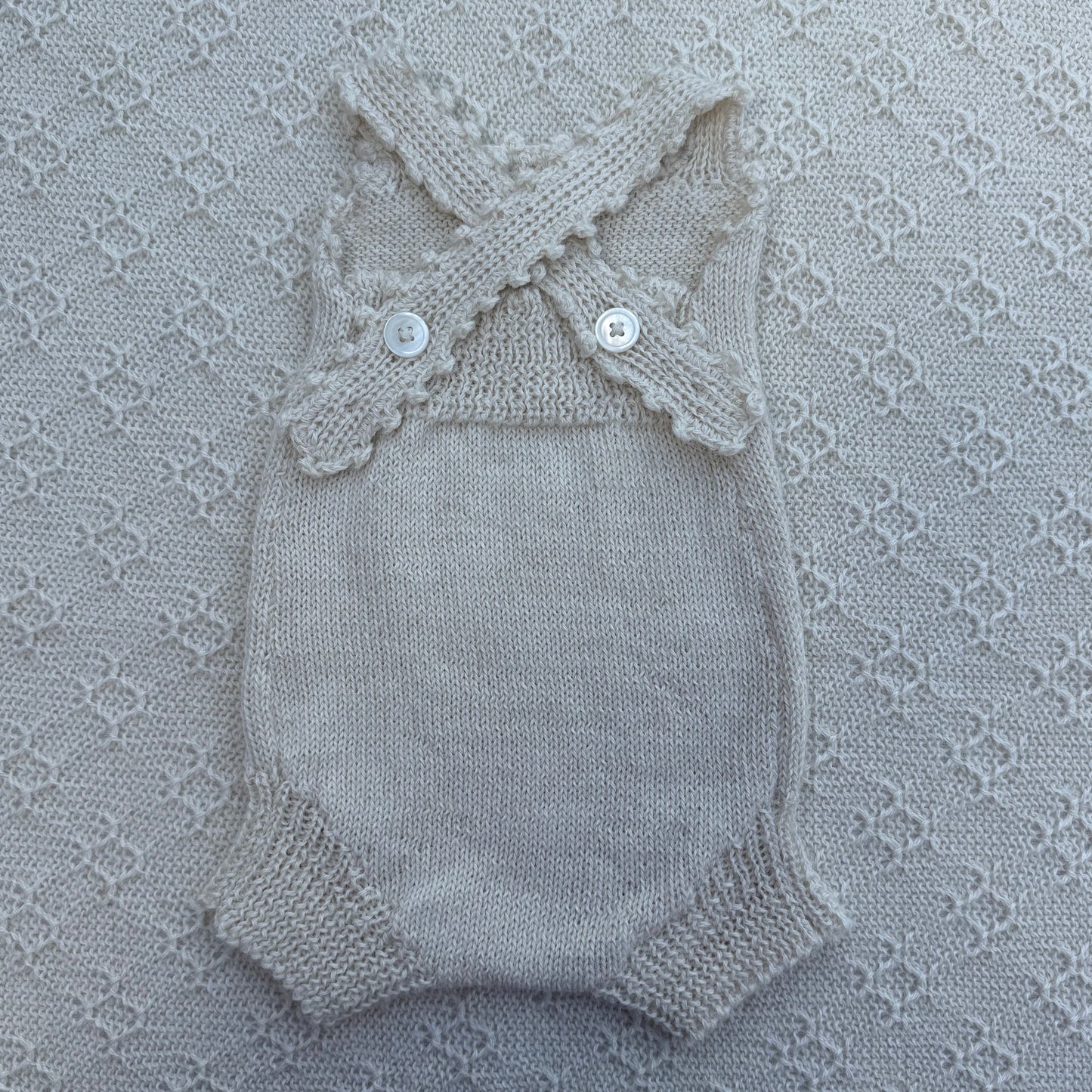 Poppy newborn alpaca romper with crochet straps back