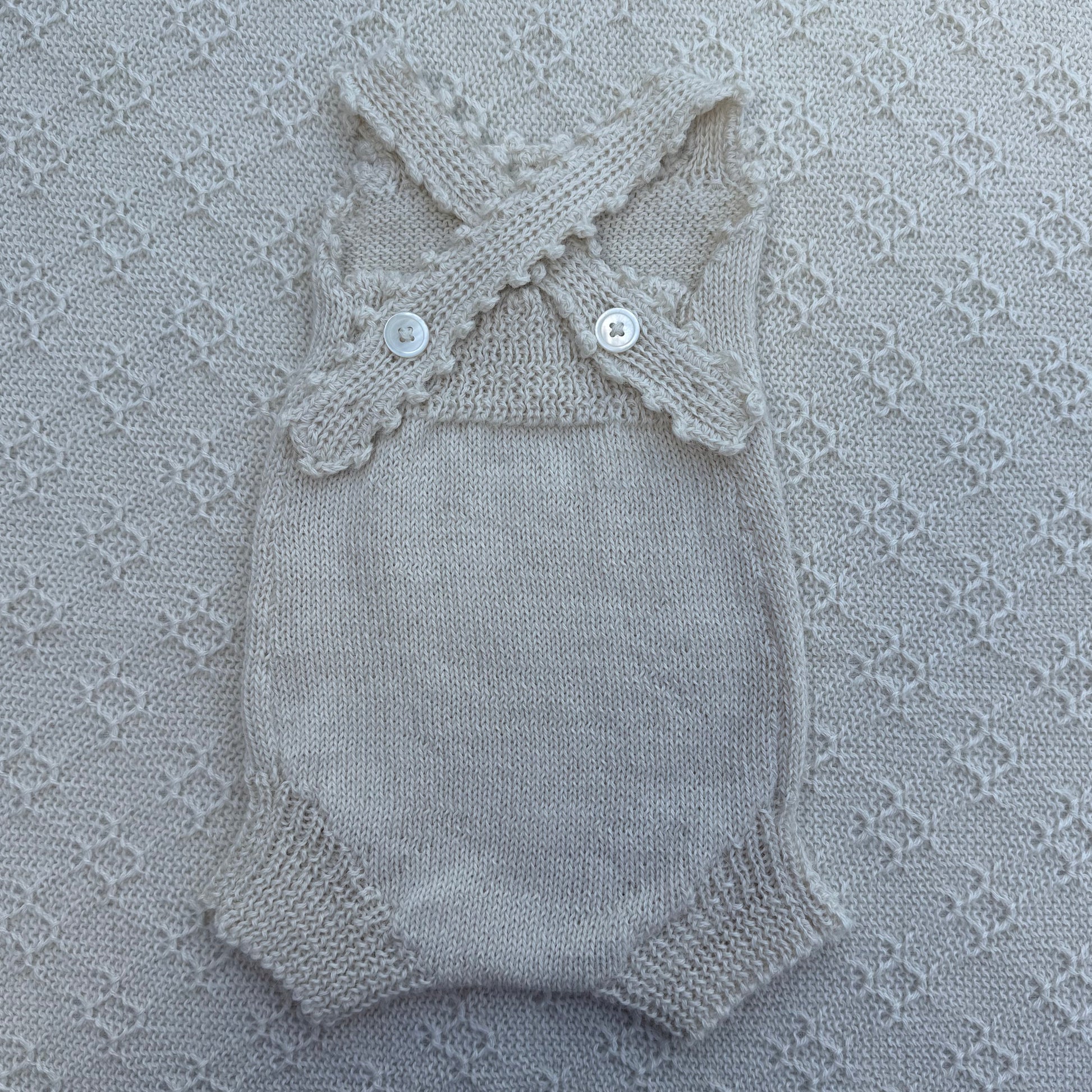Poppy newborn alpaca romper with crochet straps back
