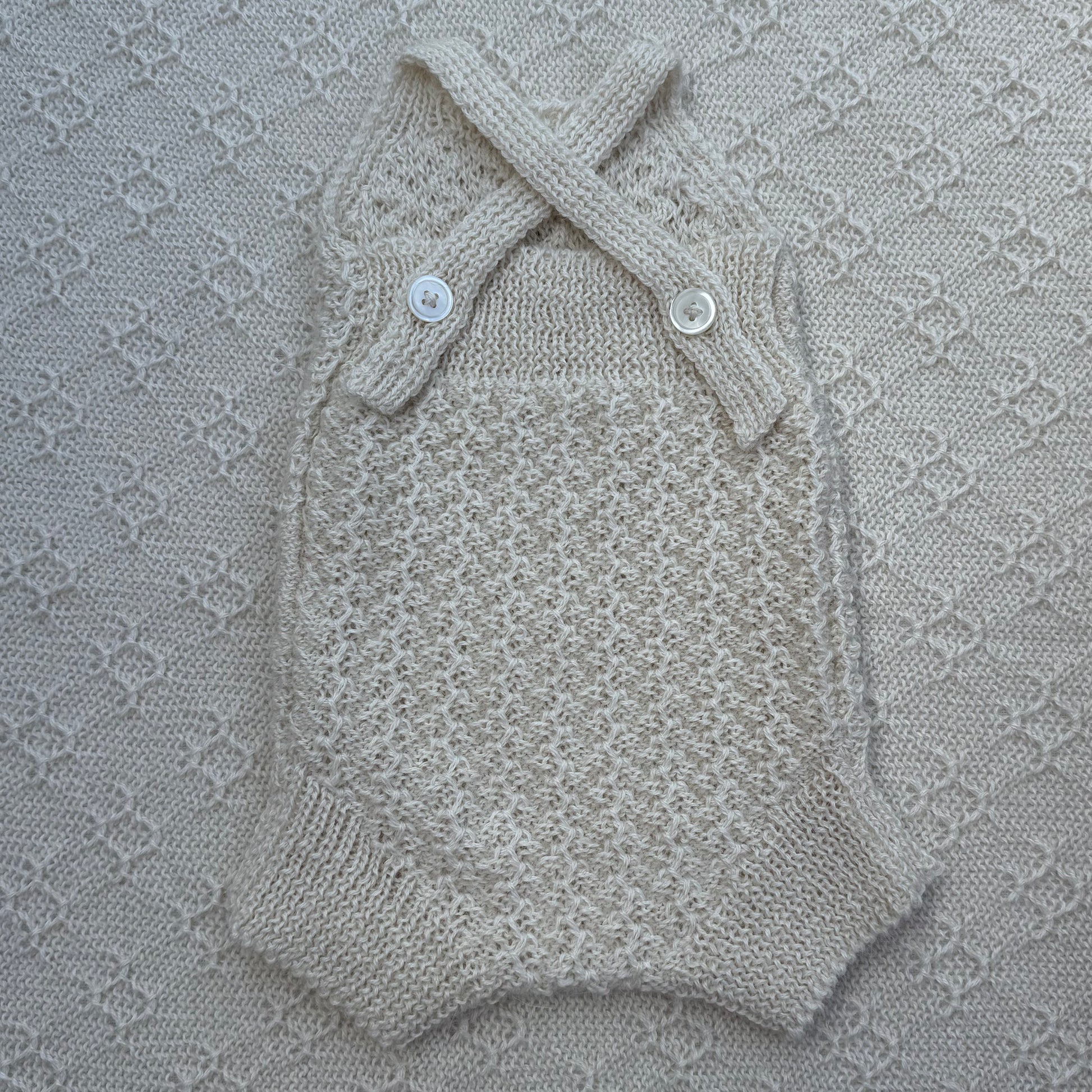 Ezra newborn baby alpaca romper with plain straps back