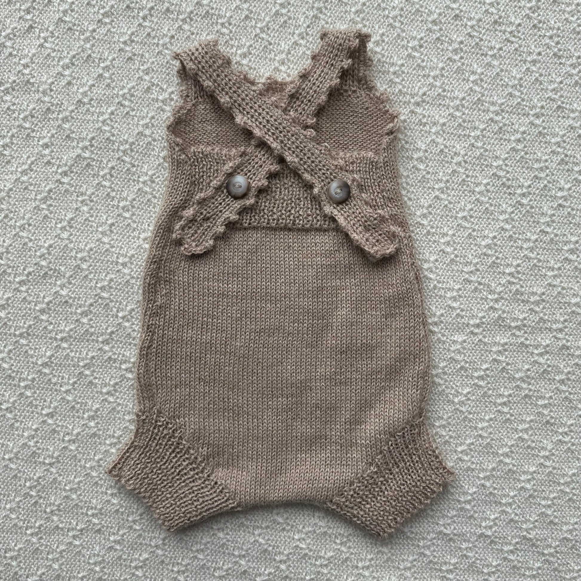 Tan baby alpaca poppy romper with crochet straps back