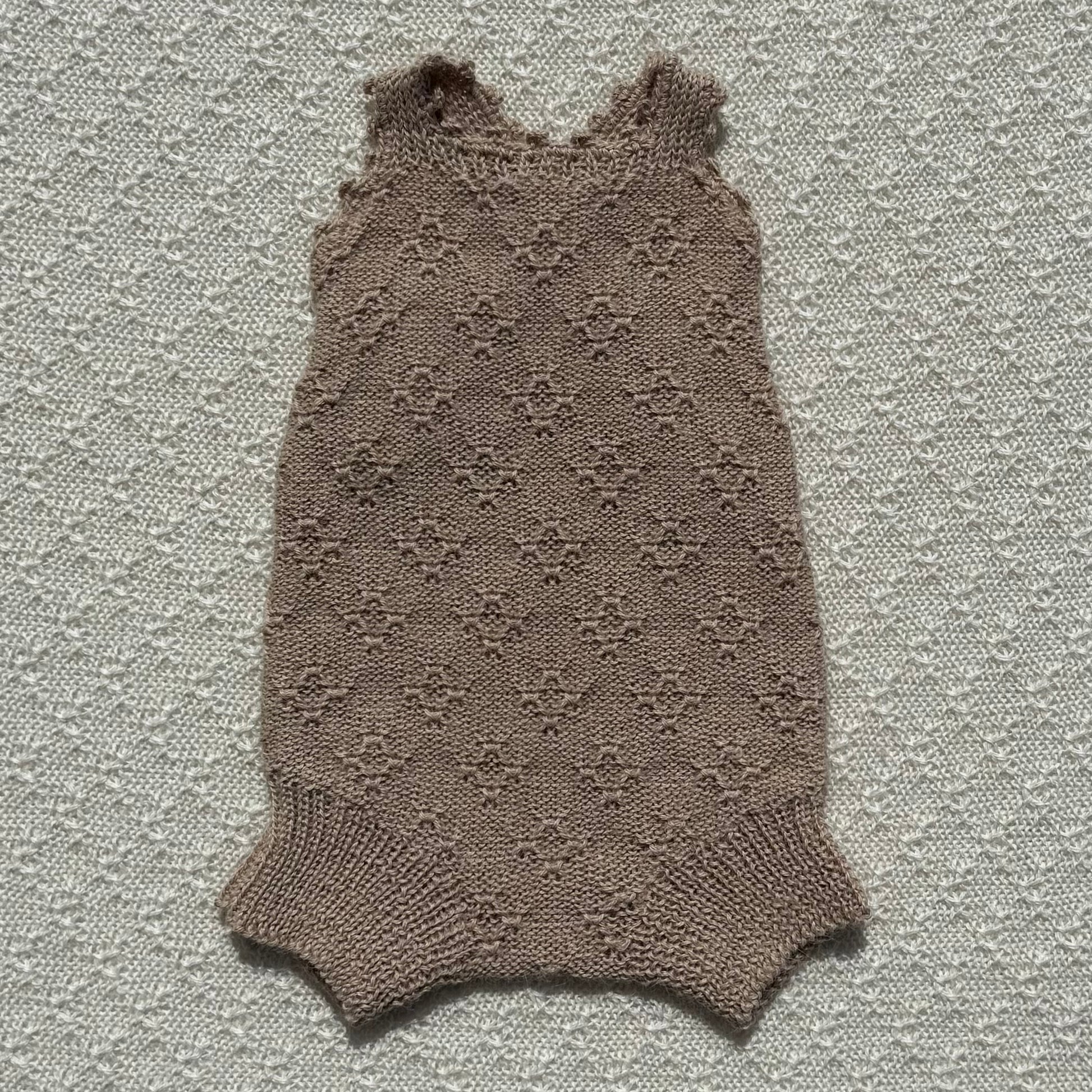 Tan Ava alpaca romper crochet strap front