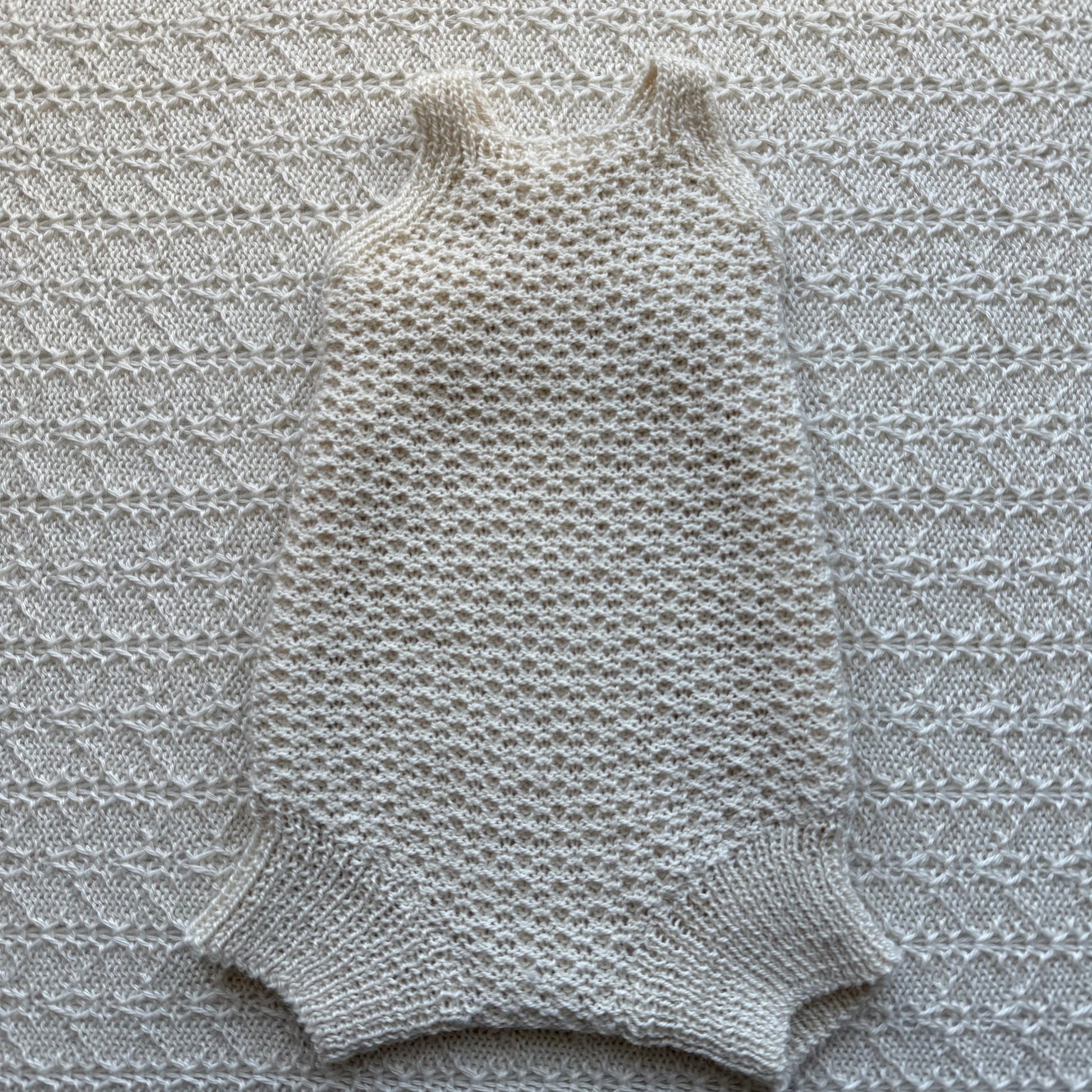Eddie newborn alpaca baby romper front