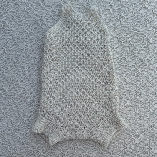 Everly newborn baby alpaca romper with plain straps front