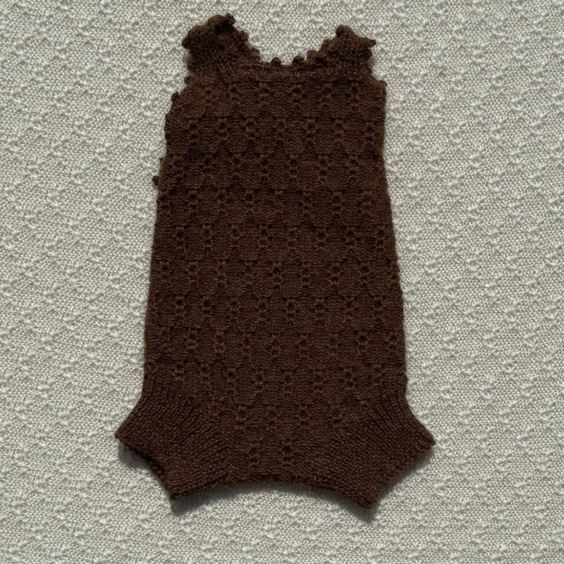 Chocolate Nellie alpaca romper crochet strap front