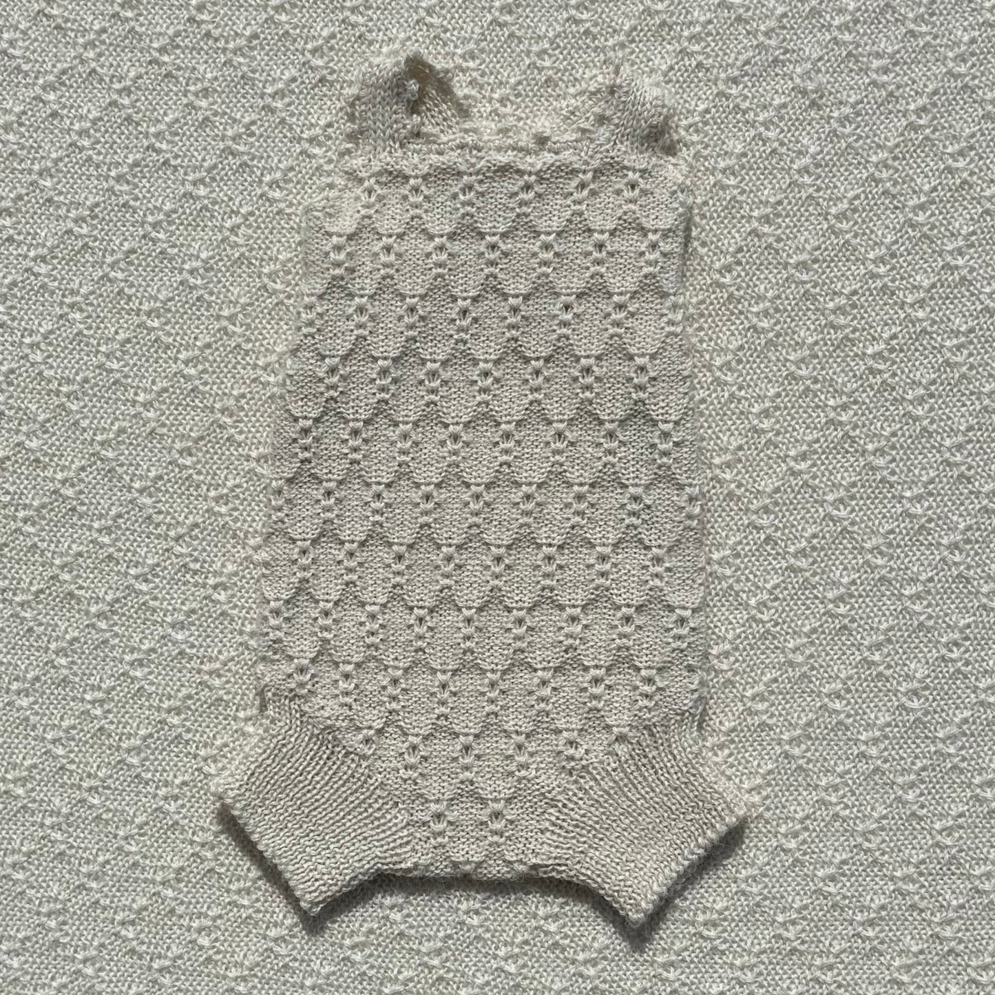 Nellie alpaca romper crochet straps front