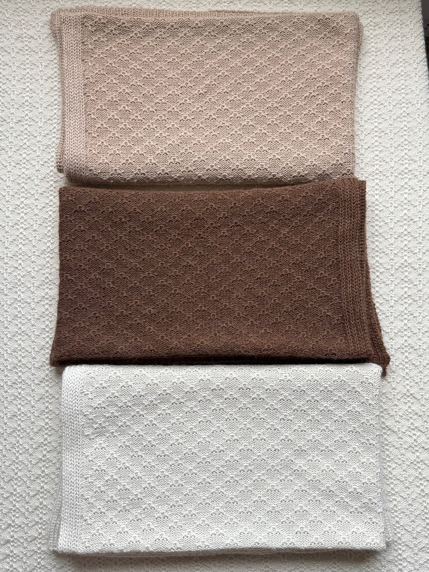Ada alpaca knitted blanket in three colours white, chocolate and tan