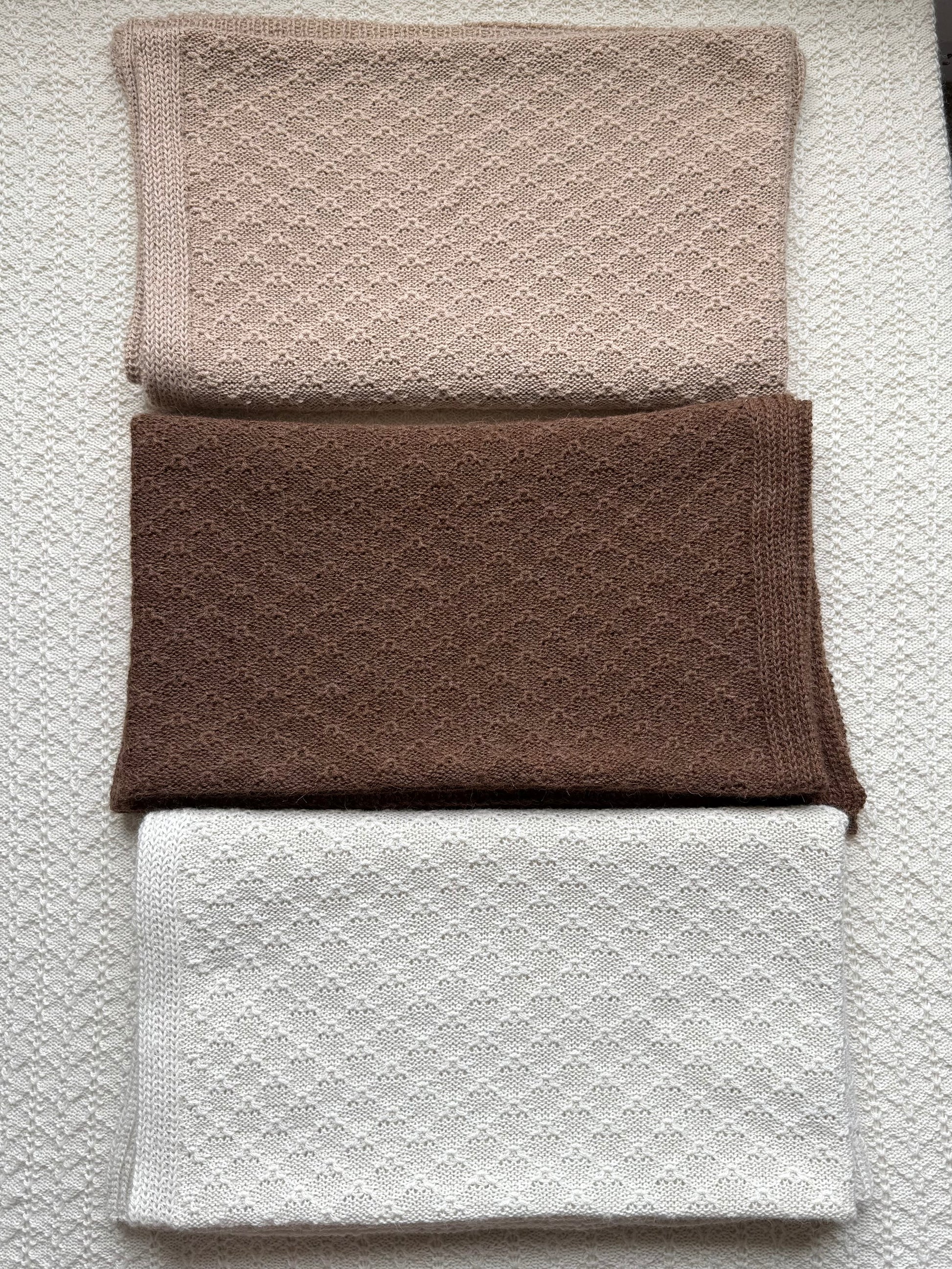 Ada alpaca knitted blanket in three colours white, chocolate and tan