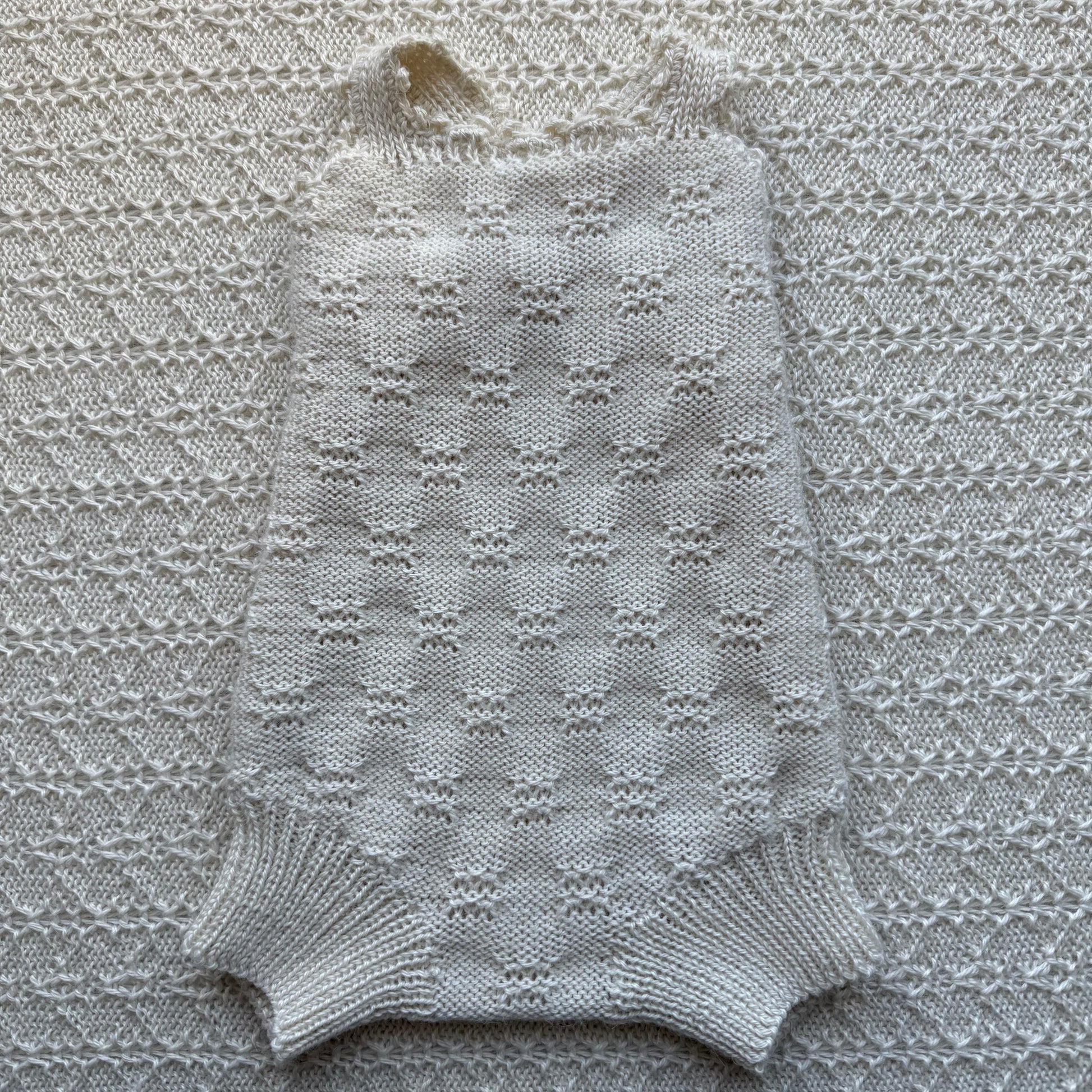 Charlie newborn alpaca romper front