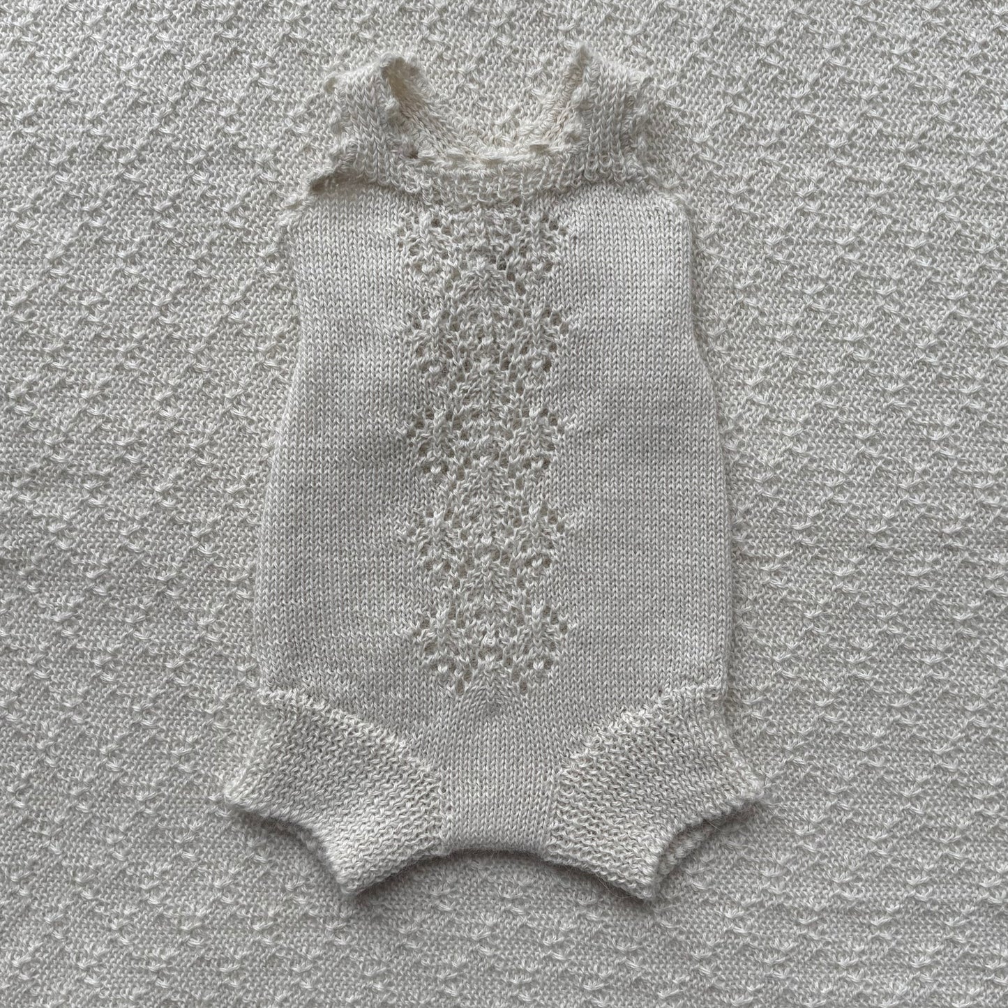 baby alpaca ivy romper with crochet straps front