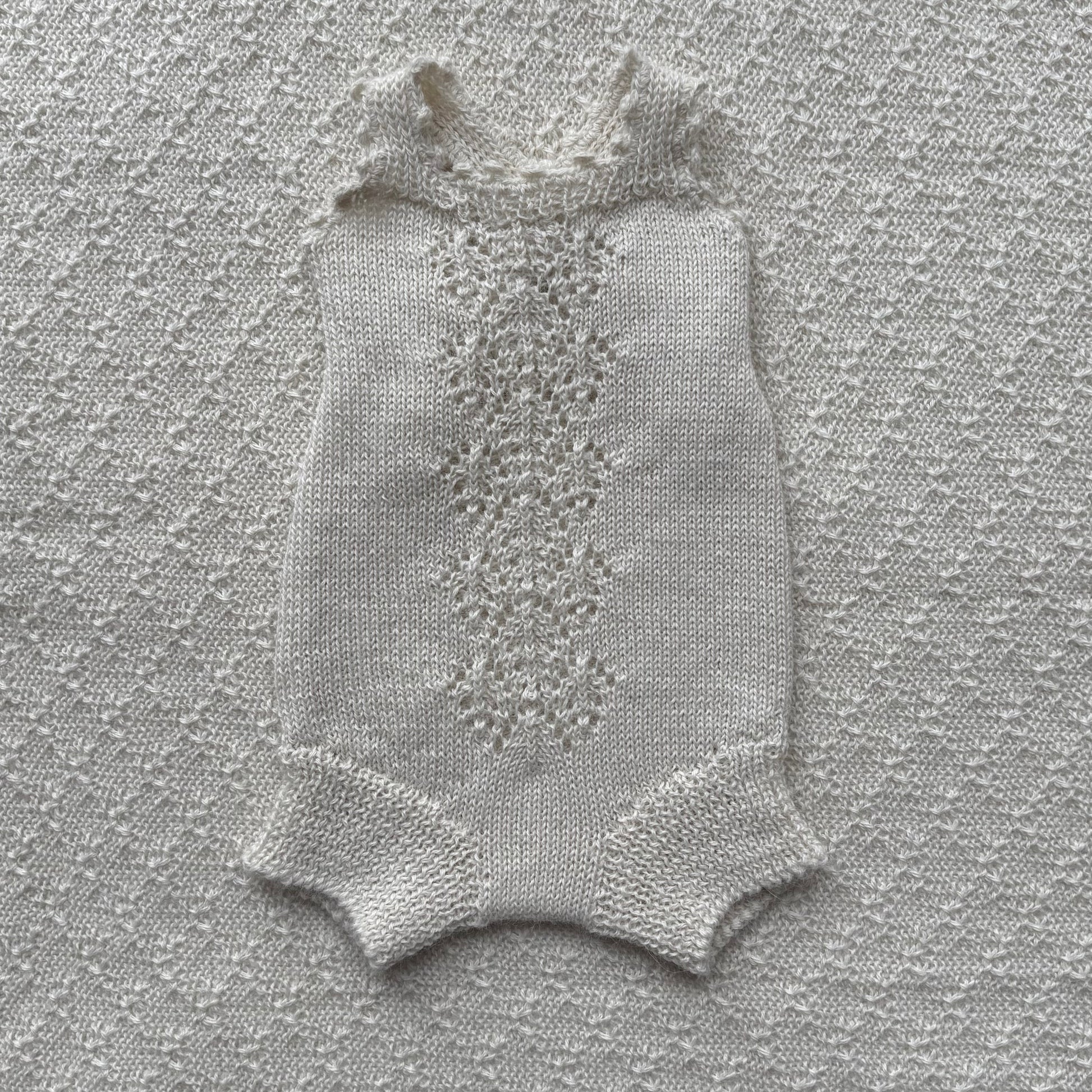 baby alpaca ivy romper with crochet straps front
